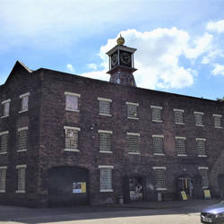 The clock tower is made partly of cast iron
