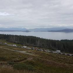 Oh look - camper vans. The Volvo is between two white cars opposite a .....