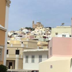 Church on hill in Syros