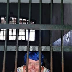 Carol held behind bars.