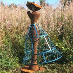Sculpture titled "Excuse Me, Ma'am? You Have a Hole in Your Ozone Layer"