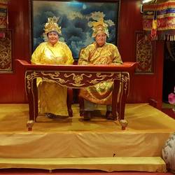 The Emperor and Empress waiting for the Royal meal to commence.