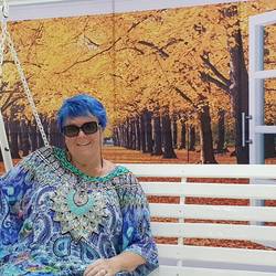 Carol is not near a park, just in a shopping centre display.