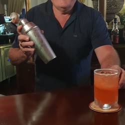 John behind the bar.