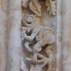 Recent carving of imp eating an ice cream on cathedral. Finlay?