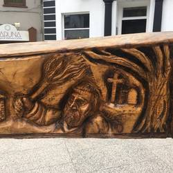 Part of a carved tree that shows the history of Waterford
