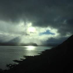 Afternoon light through rain in Reykjarfjordur.