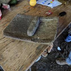 A device used to hand grind corn into flour.