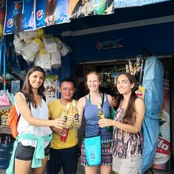 3 gringas go for a beer with the locals at the nearest minimarket