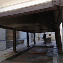 Chris stood next to the huge cooking area and chimney