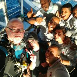 A very special day - group photo after a 100 minutes dive is a must!