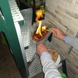 Bbqing chorizo using aguardiente! No charcoal, just alcohol.