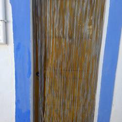 Thin ribbons hanging down deter flies