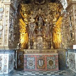Tile and gilded wood.