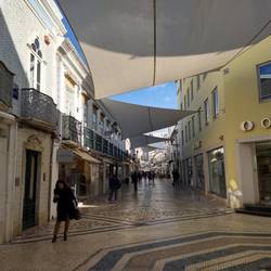 A shopping street (no cars) just ouside the old town.