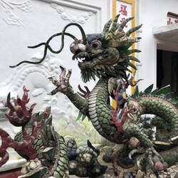 Chinese dragons protect the community house in the old town of Hoi An.
