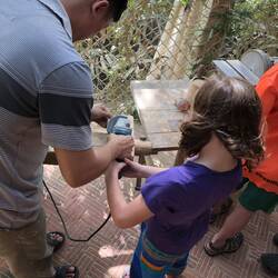 Dale works the power sander...