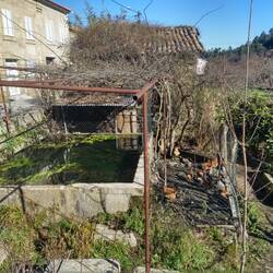 A water trough and chicken coop