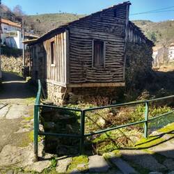 Wood and stone houses on the river