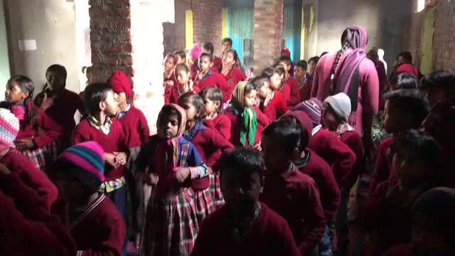 Children at the slum school during assembly