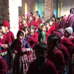 Children at the slum school during assembly