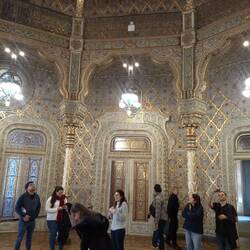 Vaughan in a room Fit for a King, checking out the pillar
