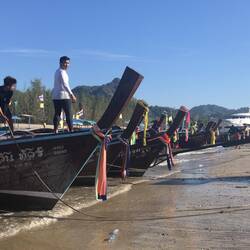 Early morning long tail boat line-up