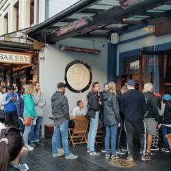 Lining up for a fergburger in Queenstown. Gotta be something to it?