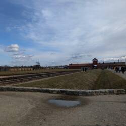 The entrance to Auschwitz-Birkenau as seen from inside the camp