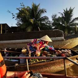 Verkäuferin auf dem Mekong