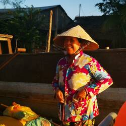 Verkäuferin auf dem Mekong