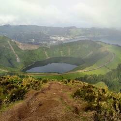 Lake Santiago in the crater and the blue and green lakes below