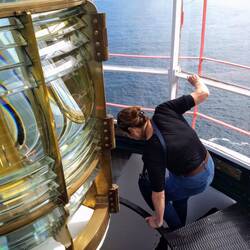 Crawling up through the lighthouse floor.