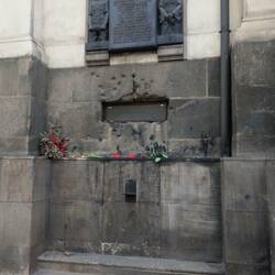 Tributes outside the crypt where the parachutists were hiding