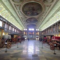 Beautiful royal riding ring houses a section of the carriage museum