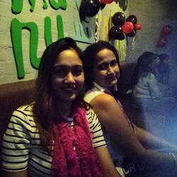 Aritra and her mum in a fancy and very westernized bar
