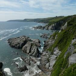 Mr FitBody was very excited to spot a path to the beach. Ms OfficeBody called him a rude name.