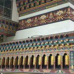 Prayer wheels in the park waiting for handover