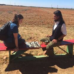 Abby and a Spaniard find common ground over a game of chess