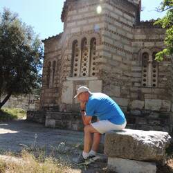 John in the Thinker pose