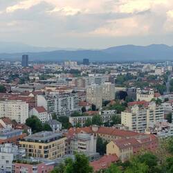 Castle view over Ljubljana toward the Julian Alps.