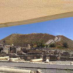 Bet Shan wall was located on top of this hill. On left, a small tree marks where King Saul was hung.