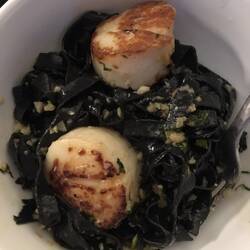 Squid ink pasta and scallops