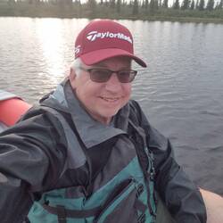 Russ fishing Old Lake Road in his kayak "Orange Man Bad"