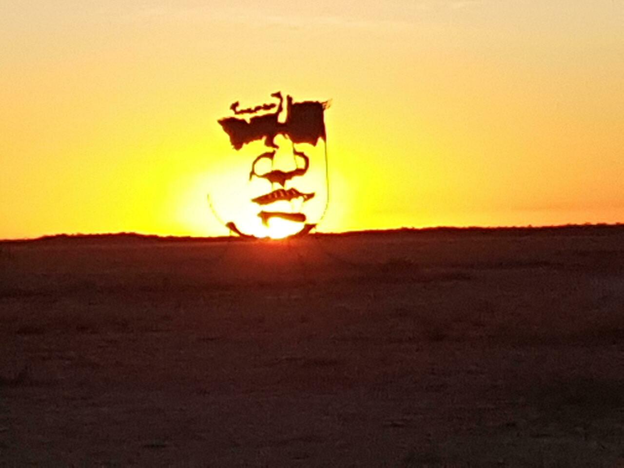 Artistic monument at sunset