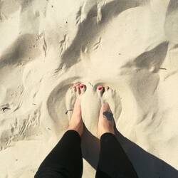 Toes in the sand. Happiness is...