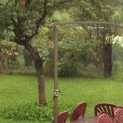 A steady rain is now falling and the mountains have disappeared.