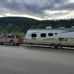 Our muddy truck and trailer in Dawson City