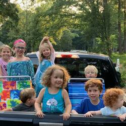 "There's somethin' women (&kids) like about a pickup man"...we were a tarp and a hose away from having a pool.
