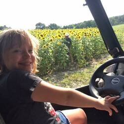 Elizabeth driving the Gator
